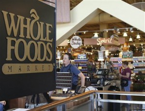 This is a view inside the Whole Foods main store showing the company logo, Friday, Aug. 24, 2007, in Austin, Texas. A federal appeals court on Thursday, Aug. 23, 2007, cleared the way for Whole Foods Market Inc. to buy rival organic grocer Wild Oats Markets Inc. (AP Photo/Harry Cabluck)