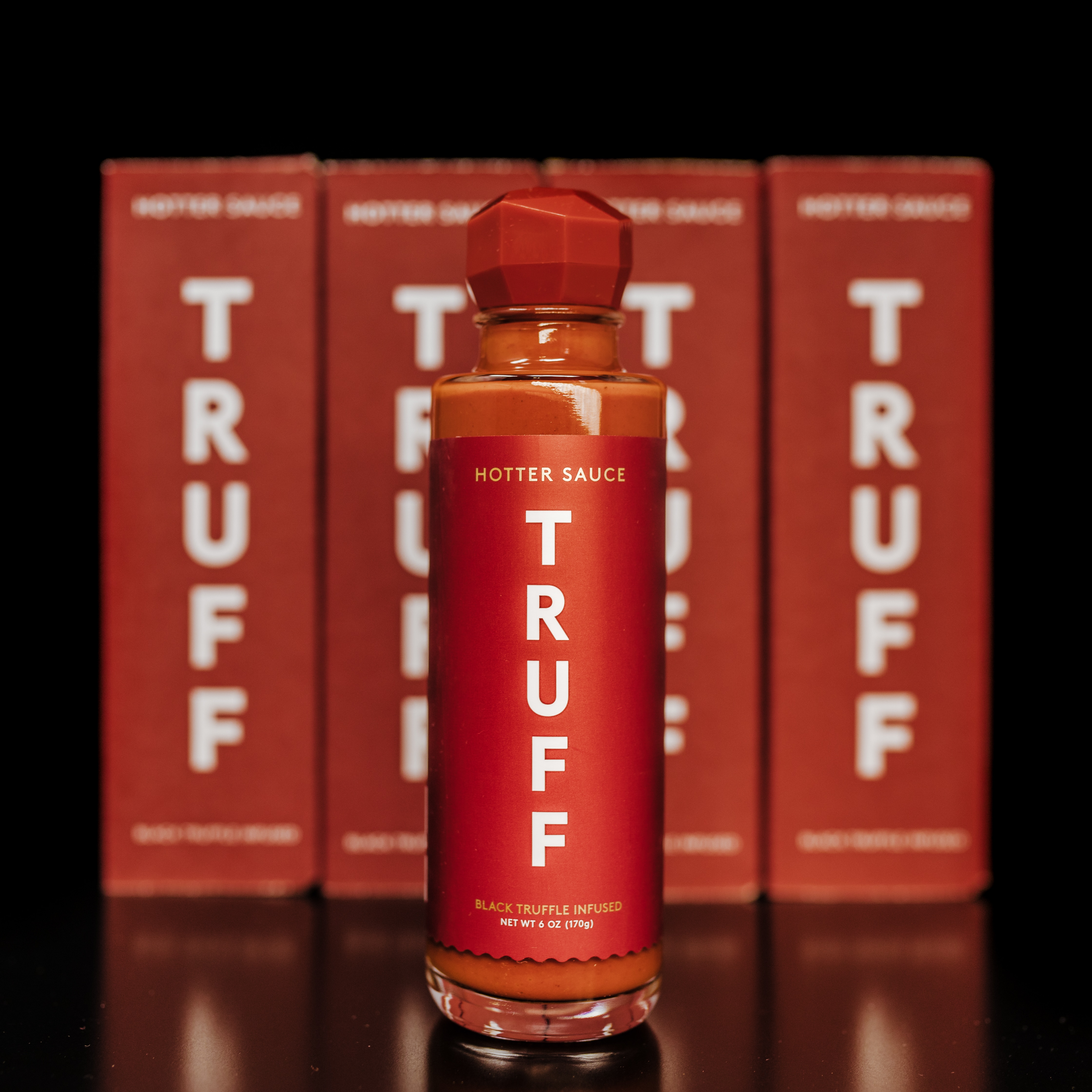 TRUFF Partners with (RED) on New Hotter Sauce | Nosh.com